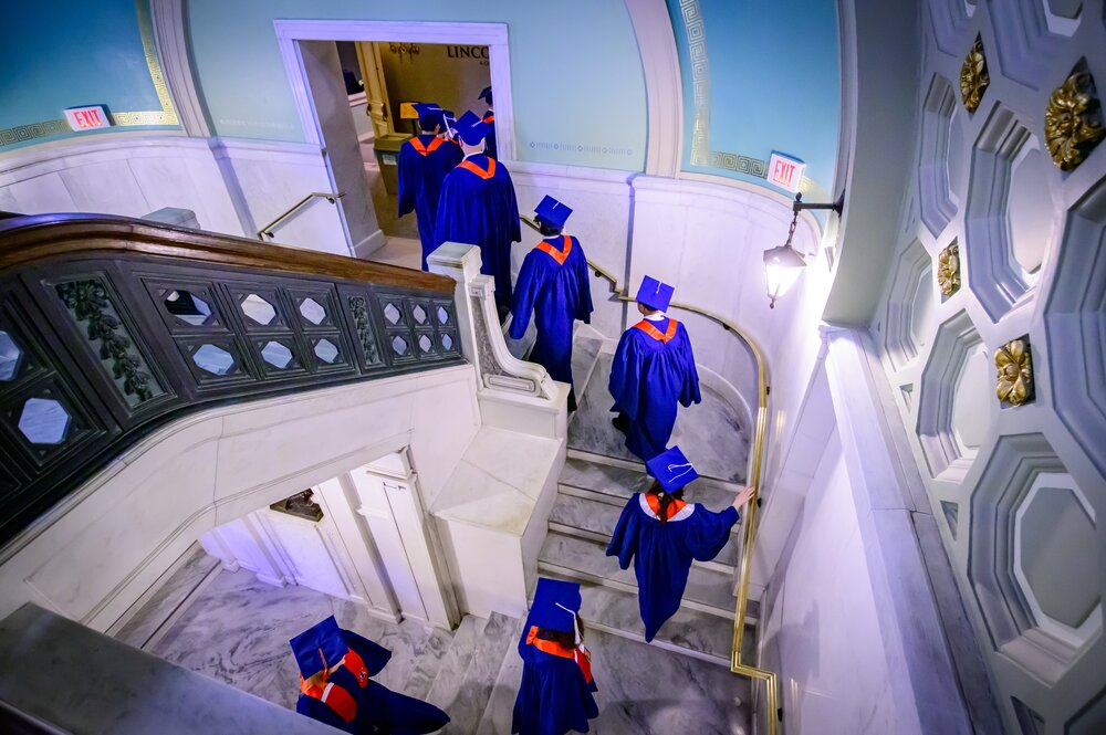 graduates walking into ceremony